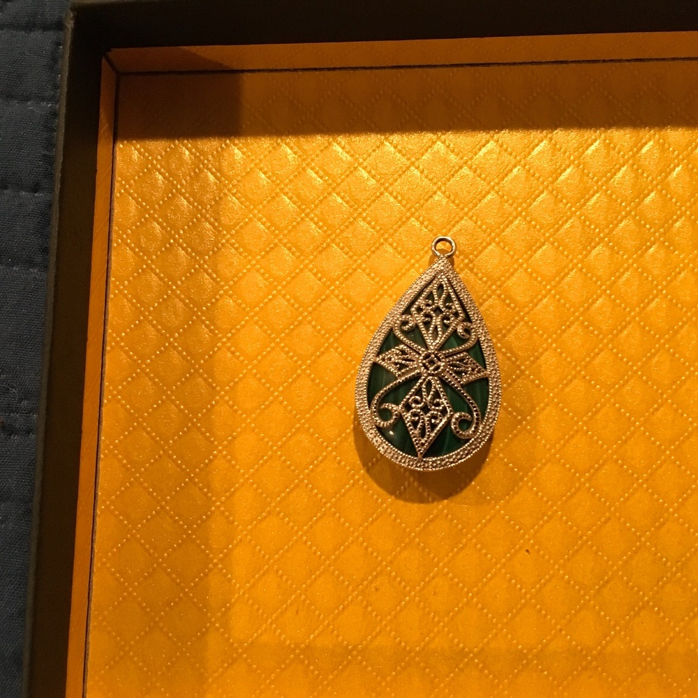 Malachite pendant with silver tone detailing